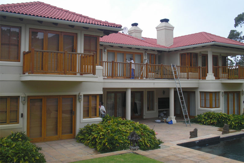 Terracotta roof estate with freshly painted exterior